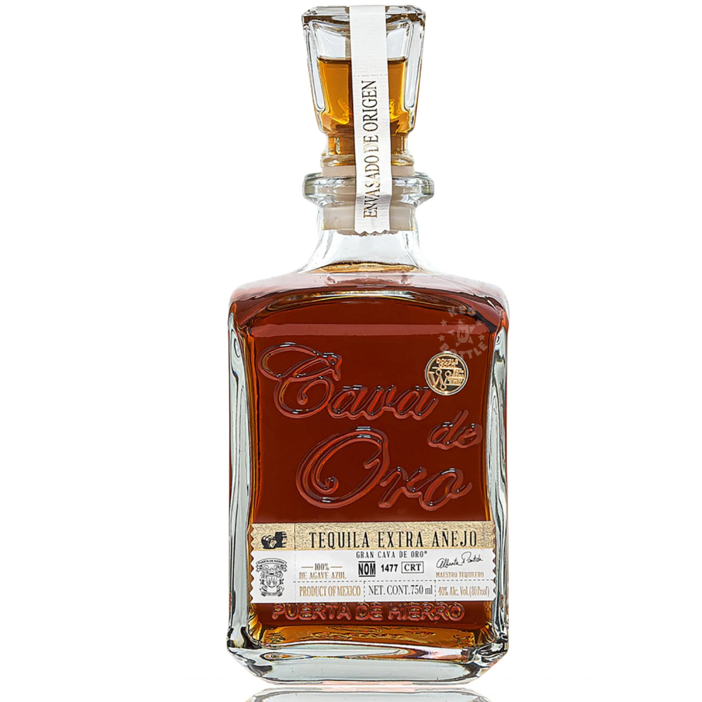 Cava de Oro Extra Añejo Tequila 750mL in an elegant clear decanter-style bottle showcasing deep amber tequila.