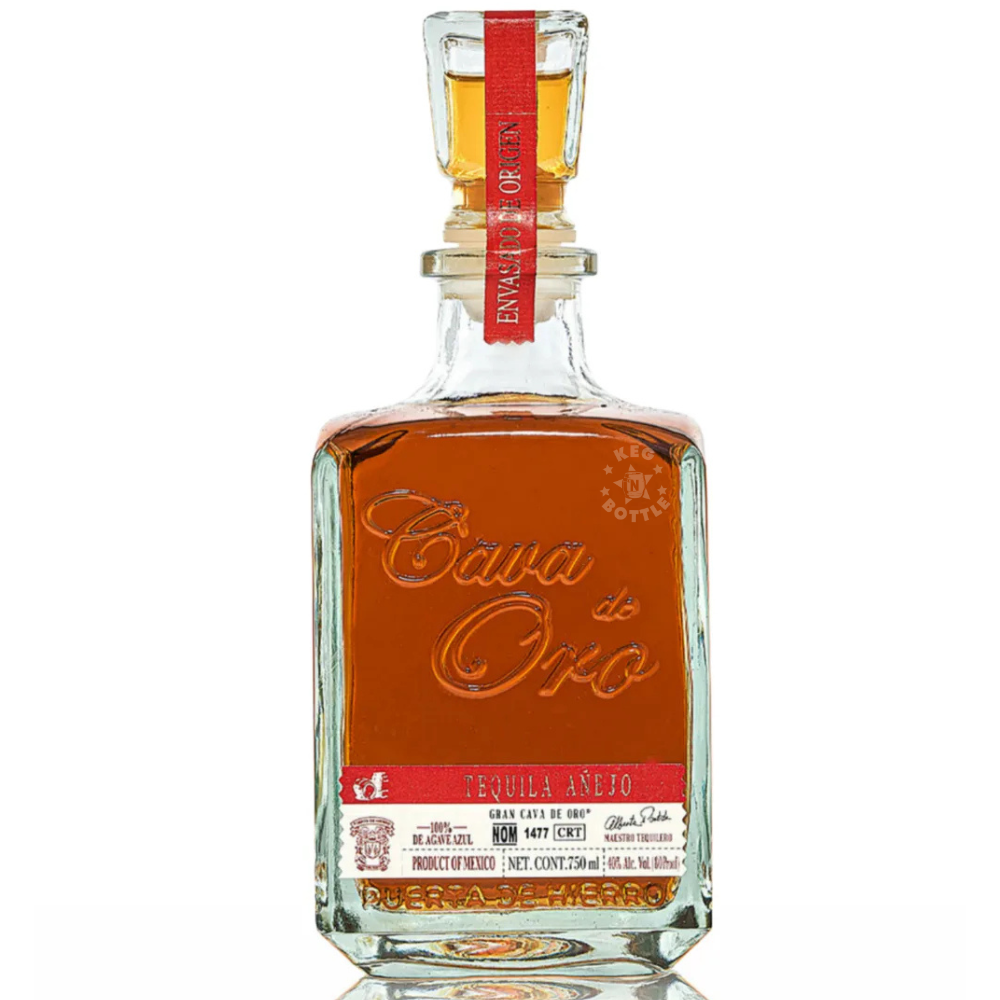 Cava de Oro Tequila Añejo 750mL premium Mexican tequila in an elegant clear decanter-style bottle with red label.