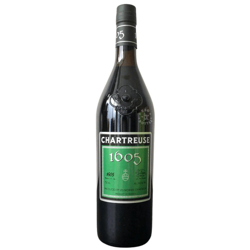 Bottle of Chartreuse 1605 Anniversary Edition French herbal liqueur with green label and black glass bottle displayed on shelf