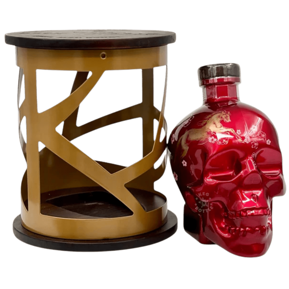 Crystal Head Year Of The Horse vodka gift set featuring red skull bottle inside decorative gold cage packaging
