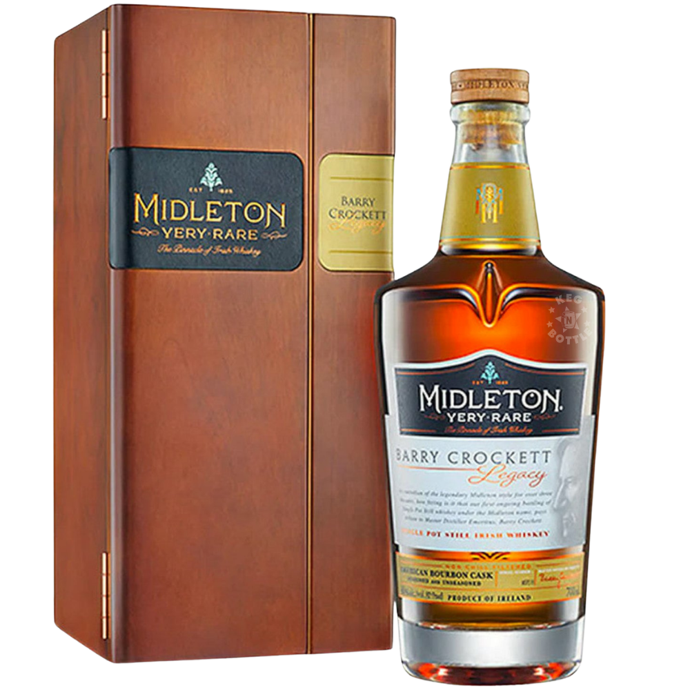 Bottle of Midleton Very Rare Barry Crockett Legacy Irish Whiskey with luxury wooden presentation box displayed beside bottle