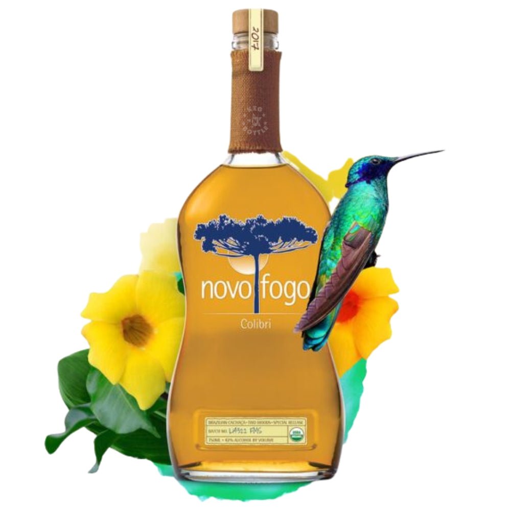 Bottle of Novo Fogo Colibri Cachaça with tropical flowers, rainforest leaves, and hummingbird illustration
