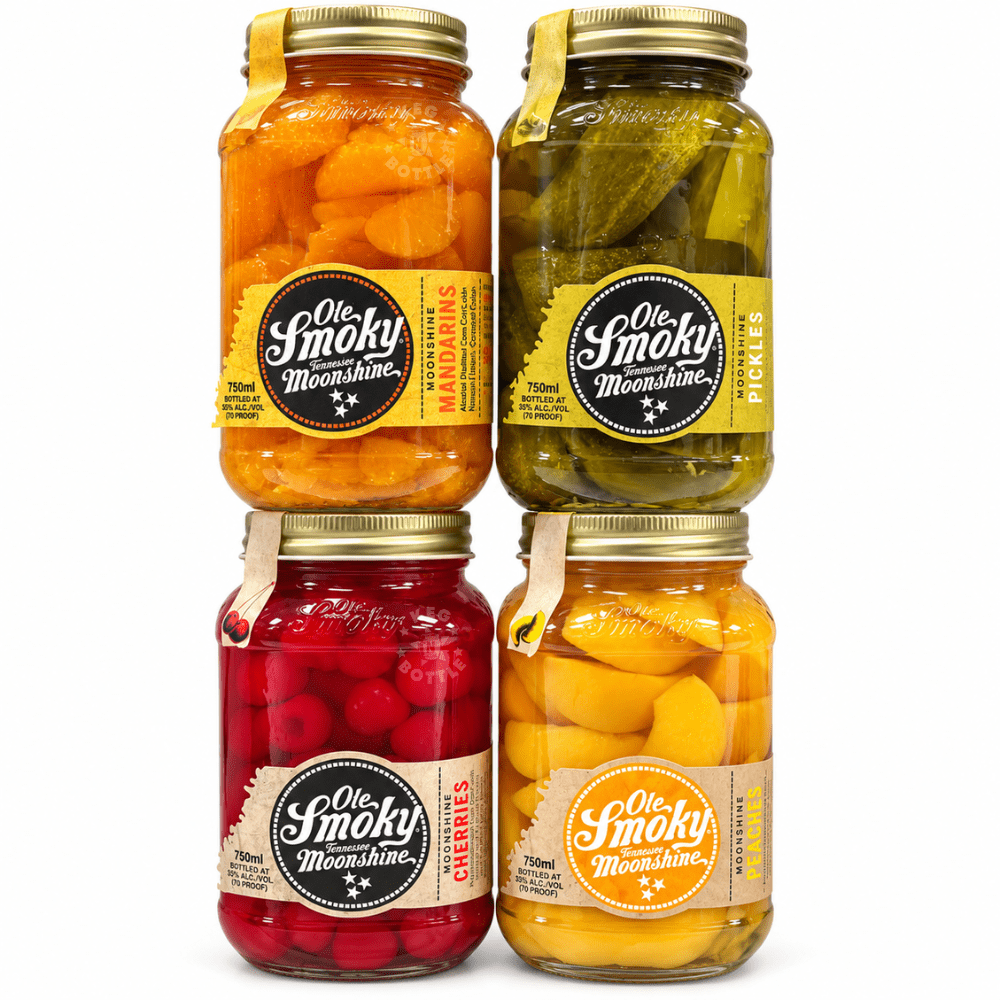 Ole Smoky Fruit Moonshine Variety Combo Pack featuring four 750mL mason jars of Moonshine Mandarins, Moonshine Pickles, Moonshine Cherries, and Moonshine Peaches.