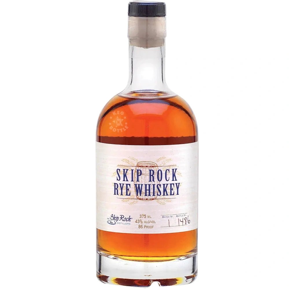 Bottle of Skip Rock Rye Whiskey 375 ml with clear label and amber spirit.