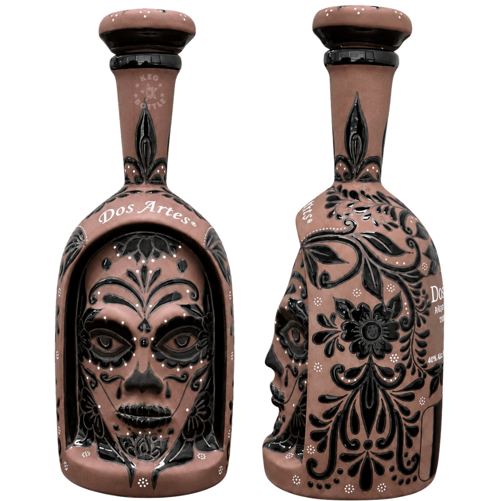 Dos Artes Calavera Doble Barrica Extra Añejo Tequila 1L in an intricately decorated ceramic Calavera bottle with sculpted face and black floral detailing.